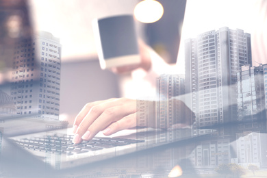 Image of Double exposure of female programmer using laptop and cityscape, closeup 