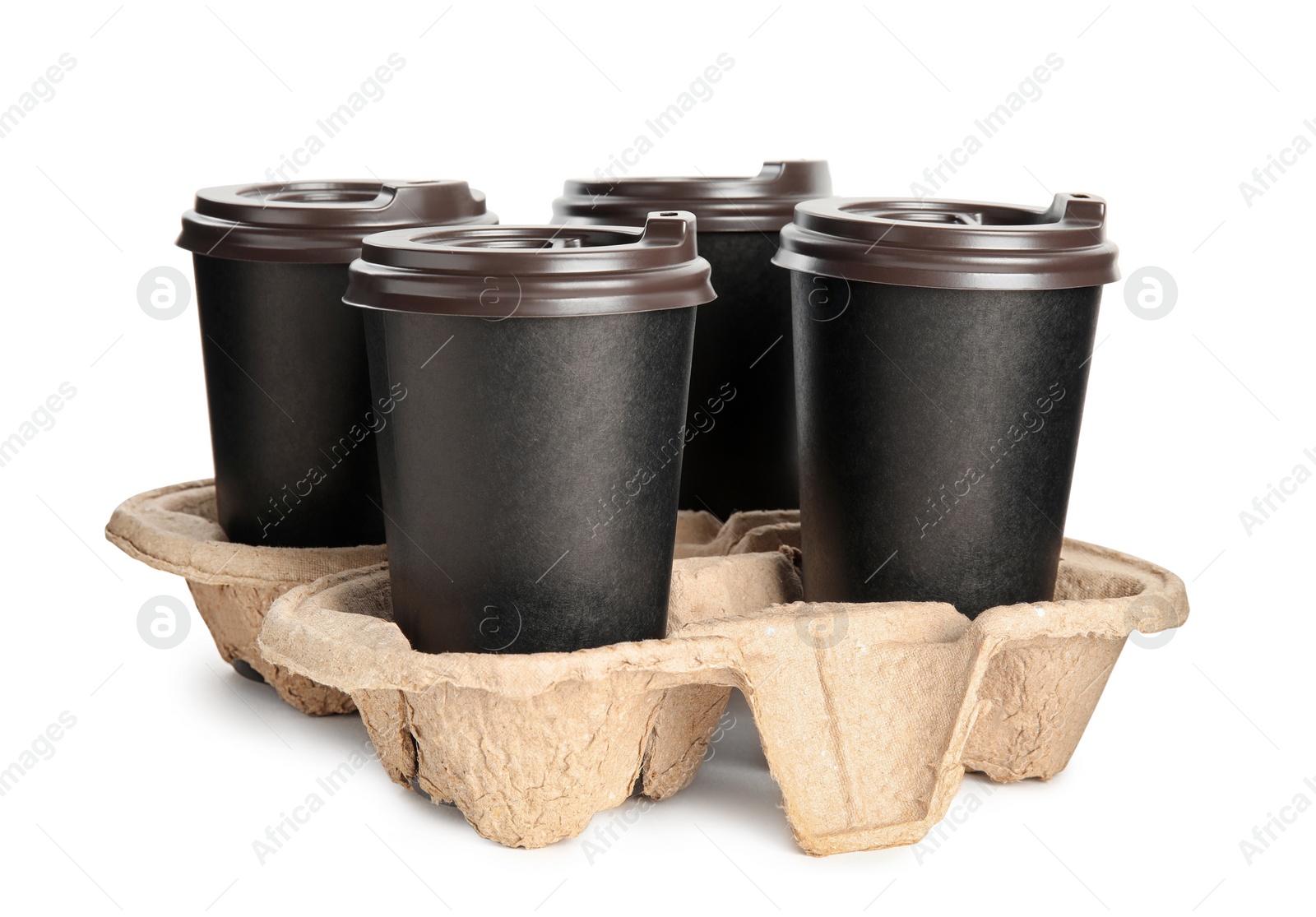 Photo of Takeaway paper coffee cups in cardboard holder on white background