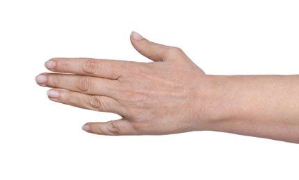 Photo of Closeup of woman's hand with aging skin on white background. Rejuvenation treatment