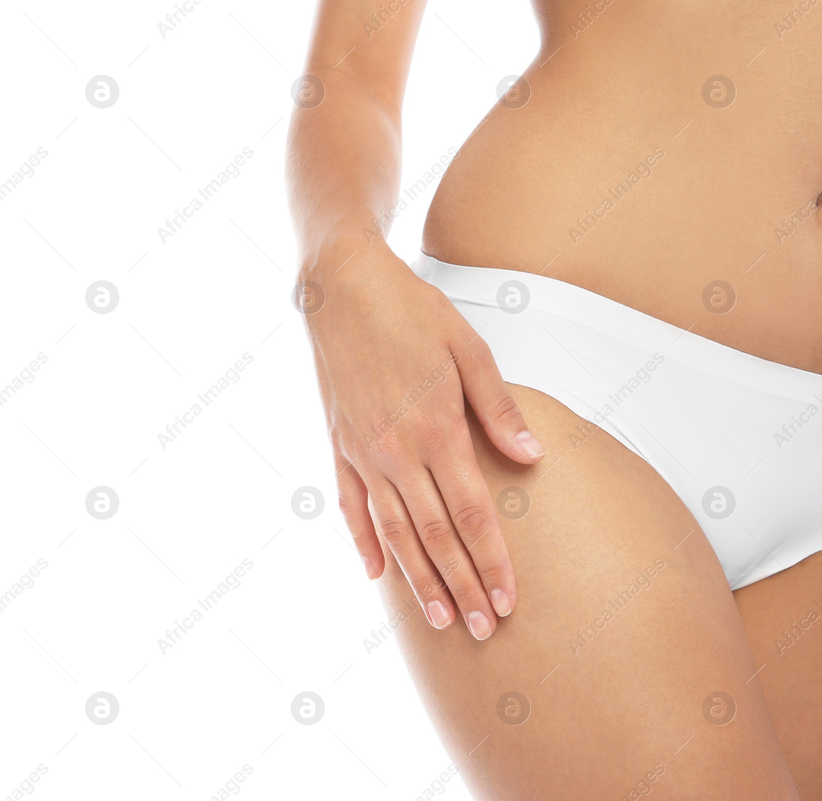 Photo of Young woman showing smooth skin after bikini epilation on white background