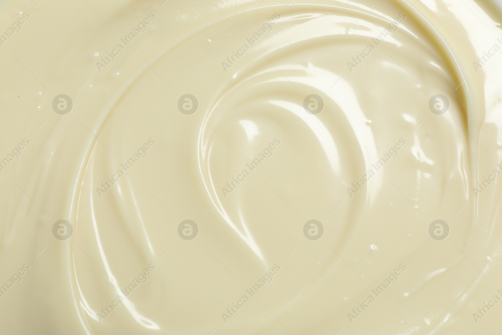 Photo of Tasty white chocolate paste as background, top view