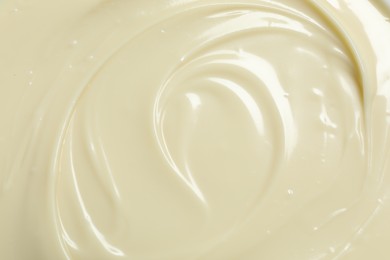 Photo of Tasty white chocolate paste as background, top view