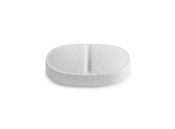 Photo of One pill on white background. Medicinal treatment