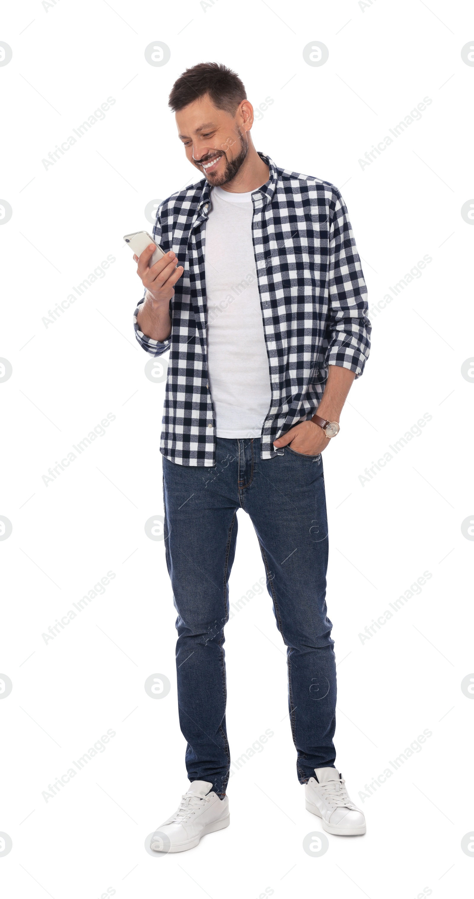 Photo of Smiling man with smartphone on white background
