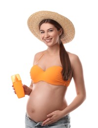 Young pregnant woman with sun protection spray on white background