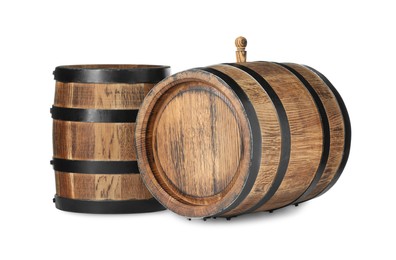 Photo of Two traditional wooden barrels isolated on white