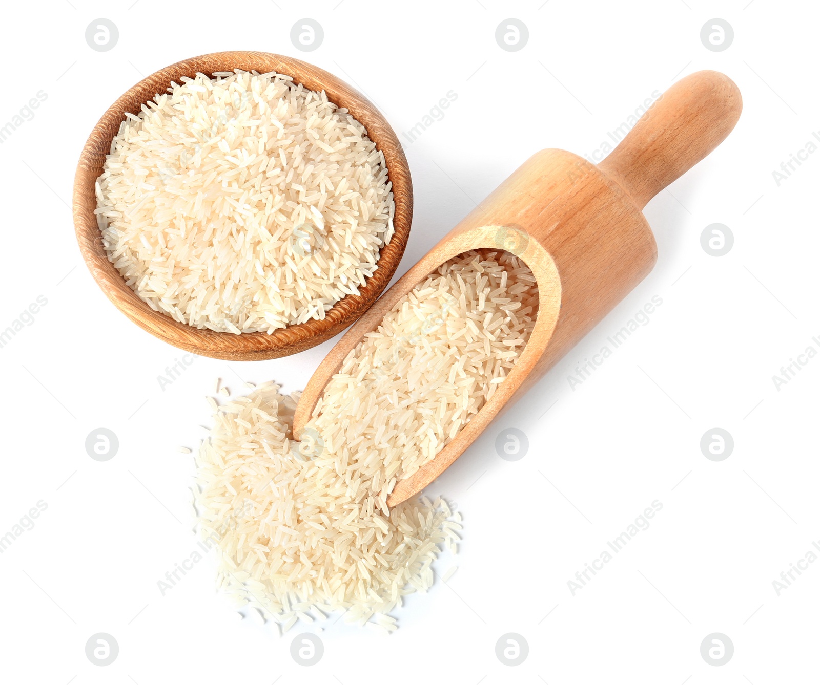 Photo of Bowl and scoop with uncooked long grain rice on white background, top view