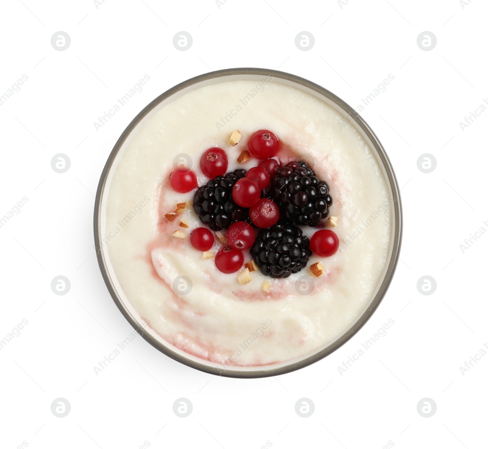 Photo of Delicious semolina pudding with berries isolated on white, top view