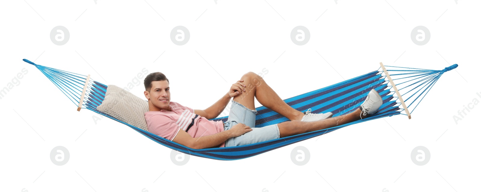 Photo of Man resting in hammock on white background