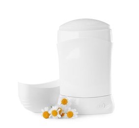 Photo of Natural deodorant with chamomile flowers on white background