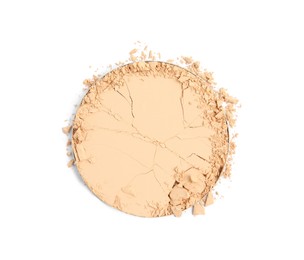 Broken face powder on white background, top view