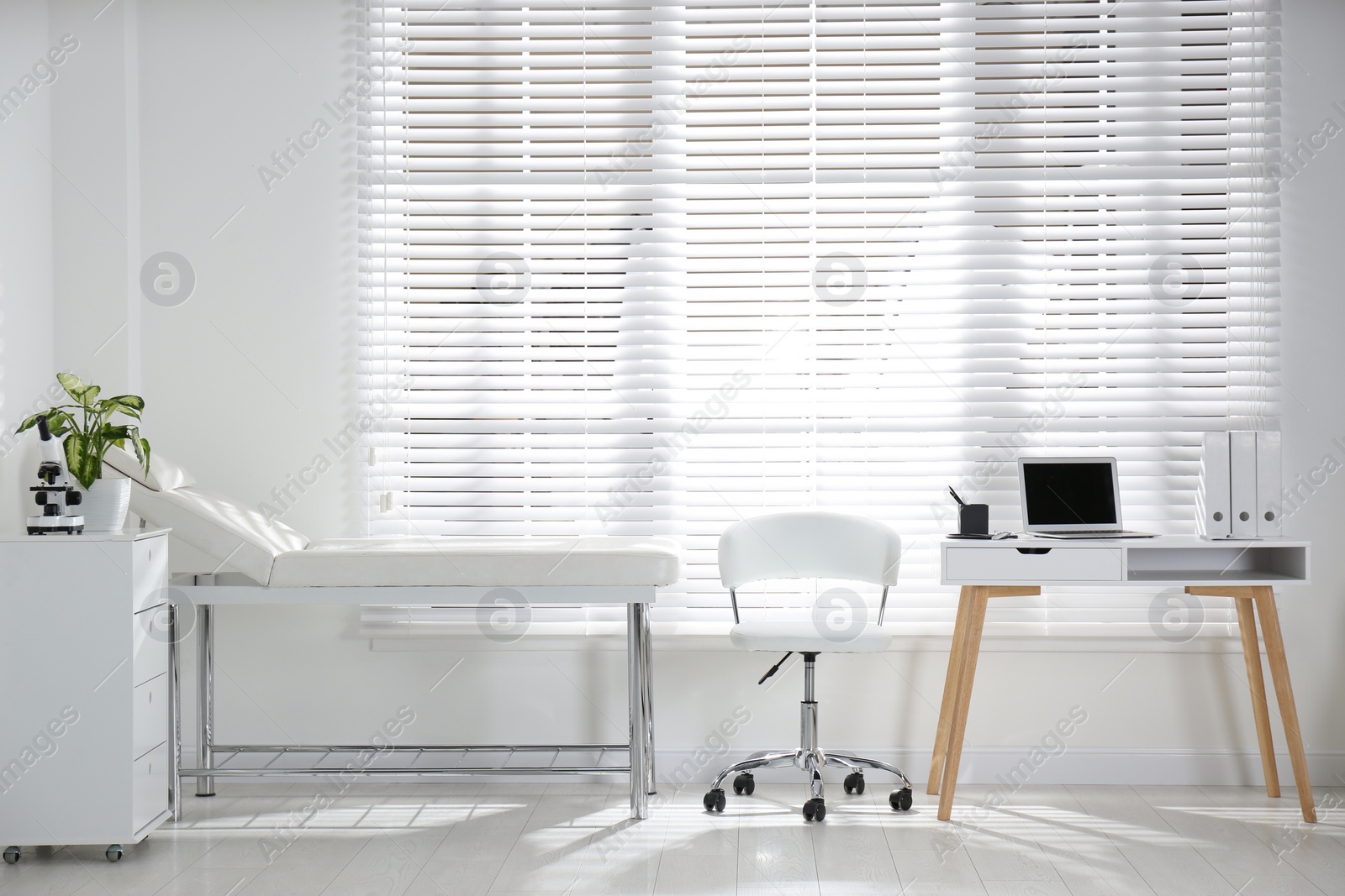 Photo of Doctor's office interior with modern workplace in clinic