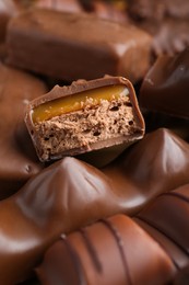 Photo of Heap of tasty chocolate bars, closeup view