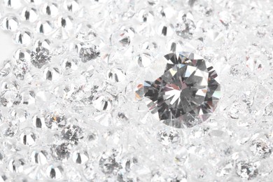 Many beautiful shiny diamonds as background, closeup