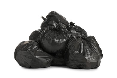 Black trash bags filled with garbage on white background