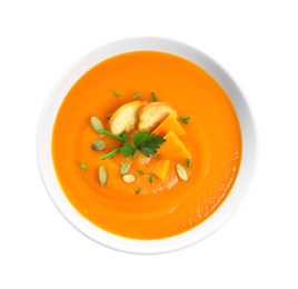 Photo of Dish with pumpkin cream soup on white background, top view. Healthy food