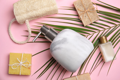 Photo of Flat lay composition with marble soap dispenser on pink background