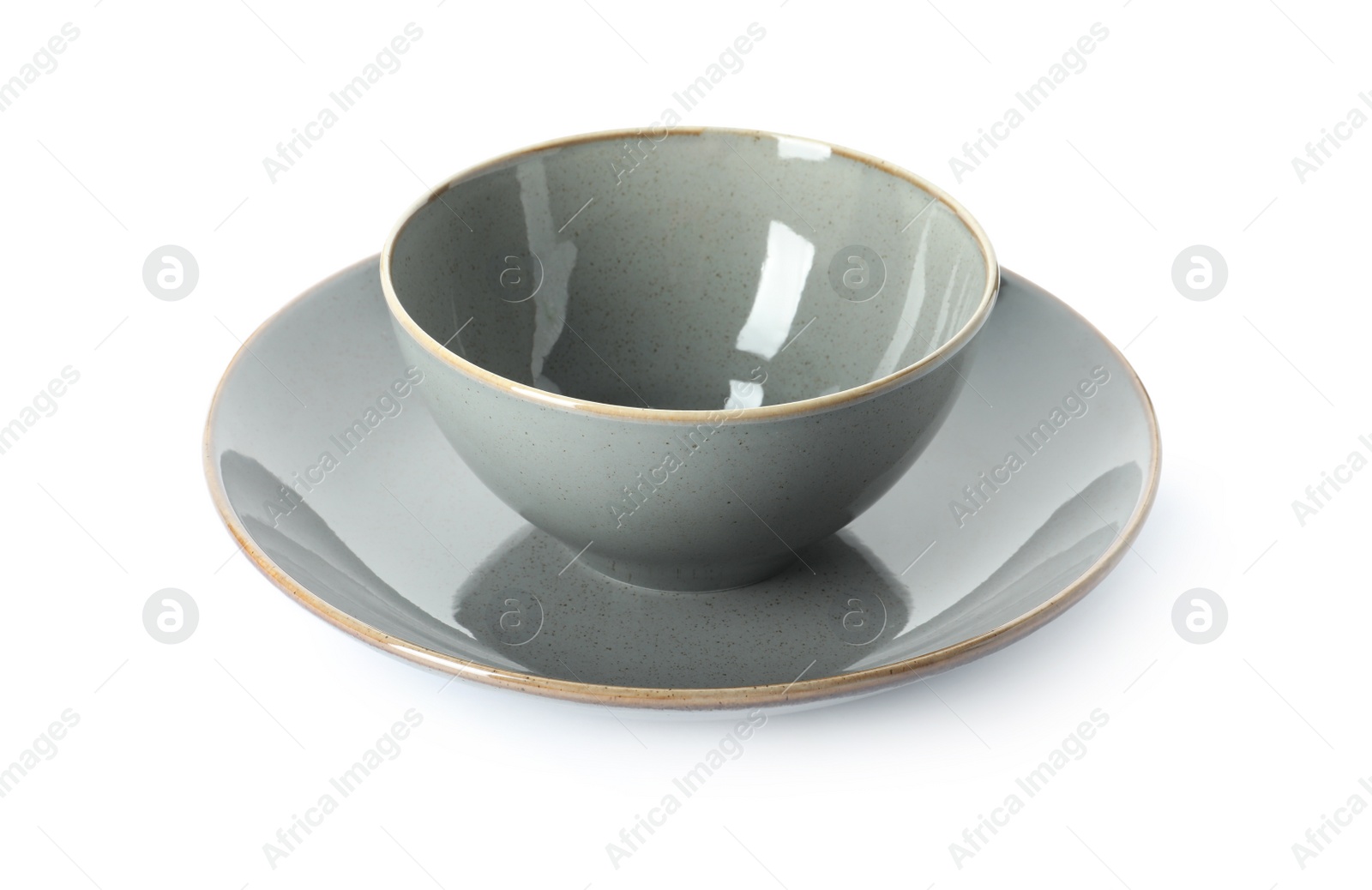 Photo of New grey ceramic plate and bowl on white background