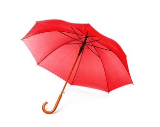 Photo of Modern opened red umbrella isolated on white