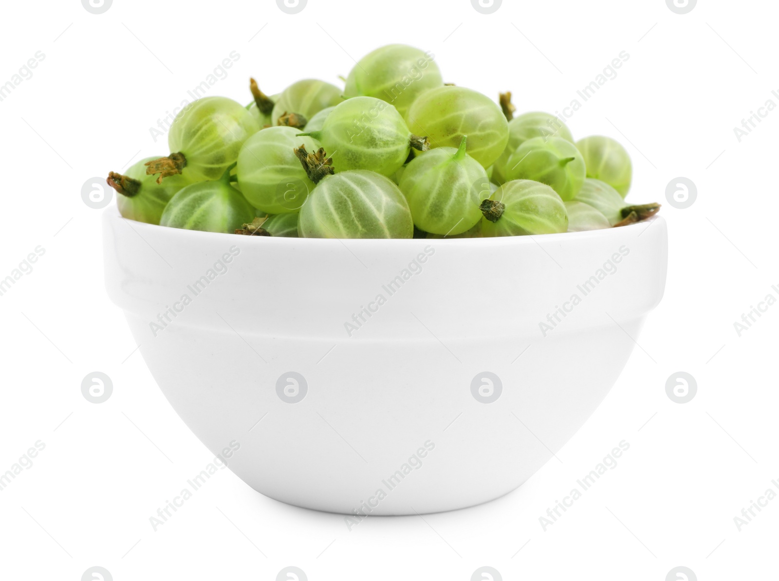 Photo of Ceramic bowl full of ripe gooseberries isolated on white