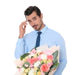 Young handsome man with beautiful flower bouquet on white background