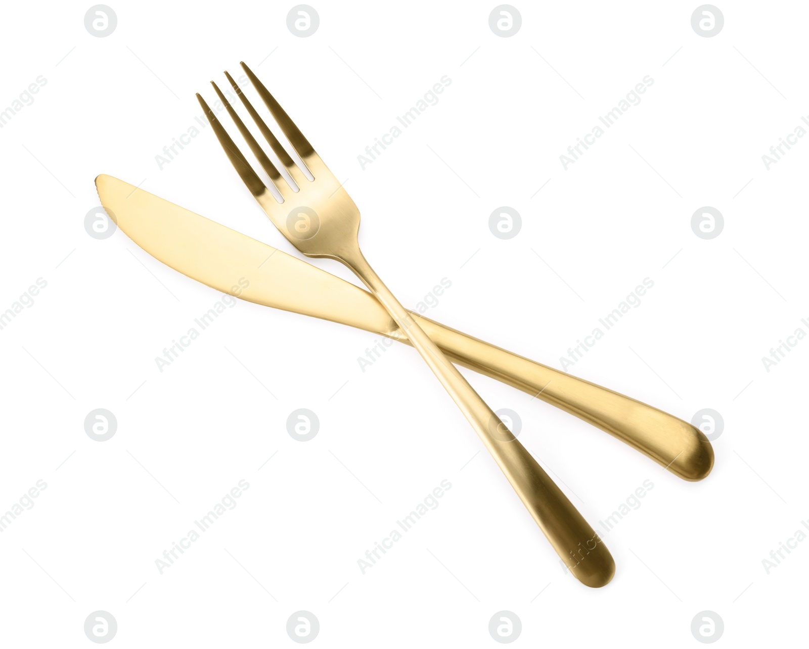 Photo of Shiny golden fork and knife isolated on white. Luxury cutlery