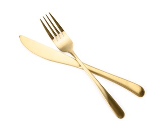 Shiny golden fork and knife isolated on white. Luxury cutlery