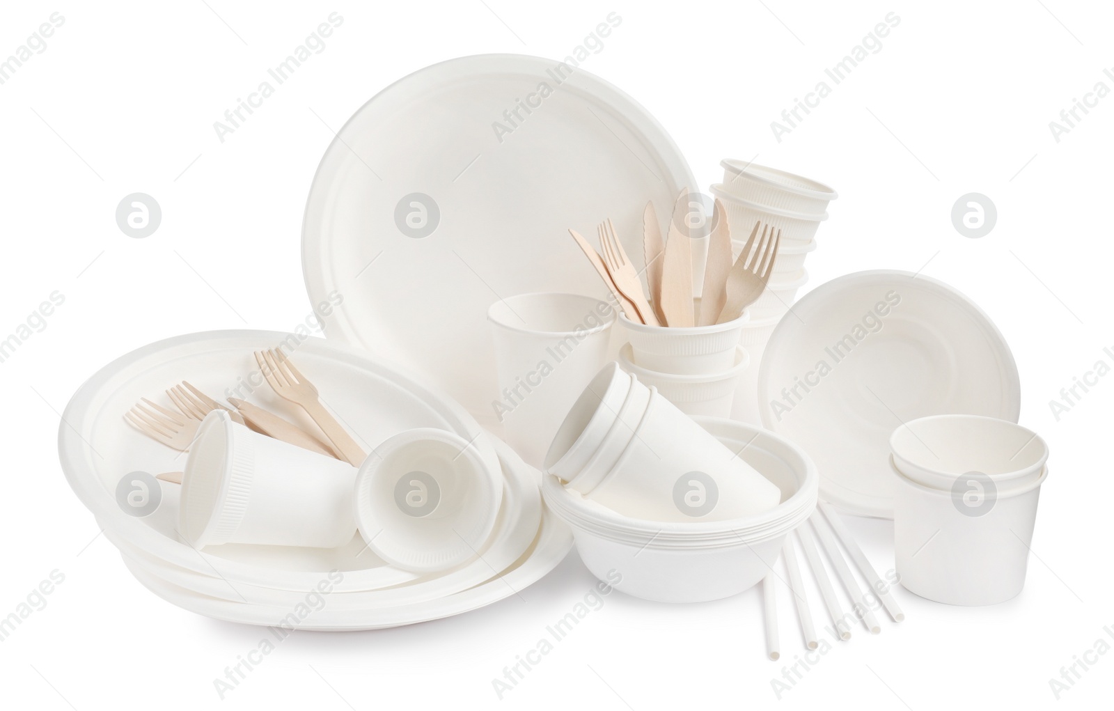 Photo of Set of disposable tableware on white background