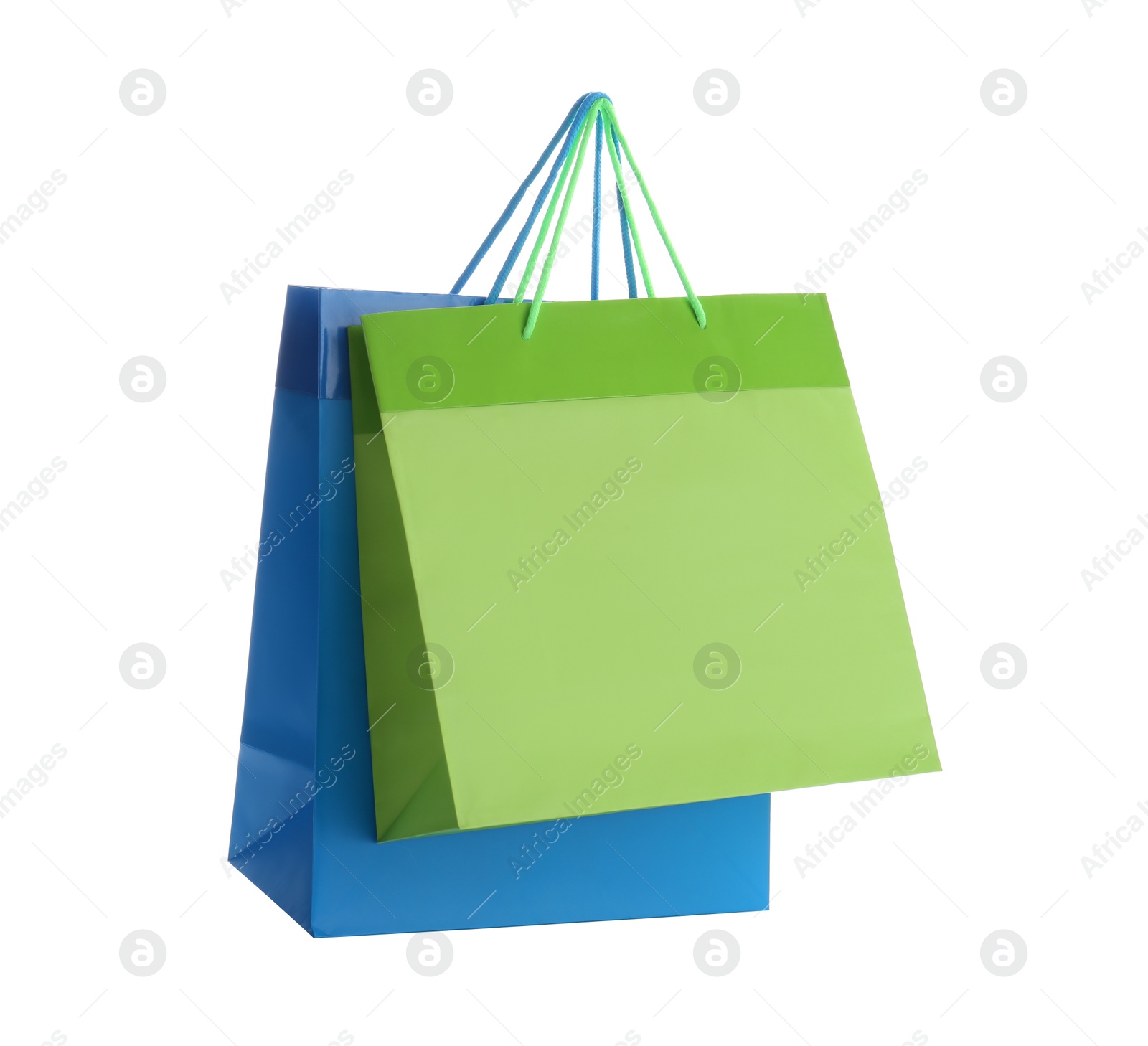 Photo of Different paper shopping bags isolated on white