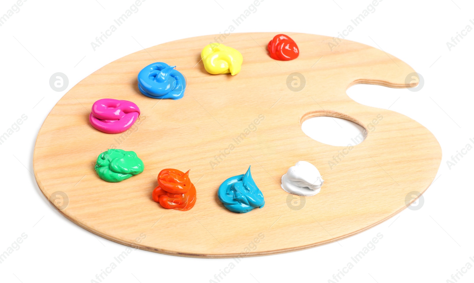 Photo of Palette with paints on white background. Artist equipment