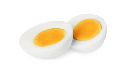 Photo of Halves of fresh hard boiled egg on white background