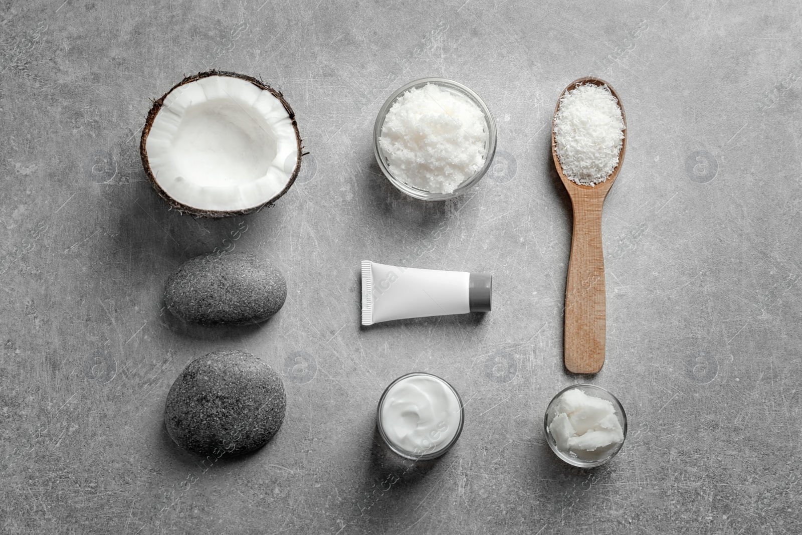 Photo of Composition with natural coconut scrub on grey background
