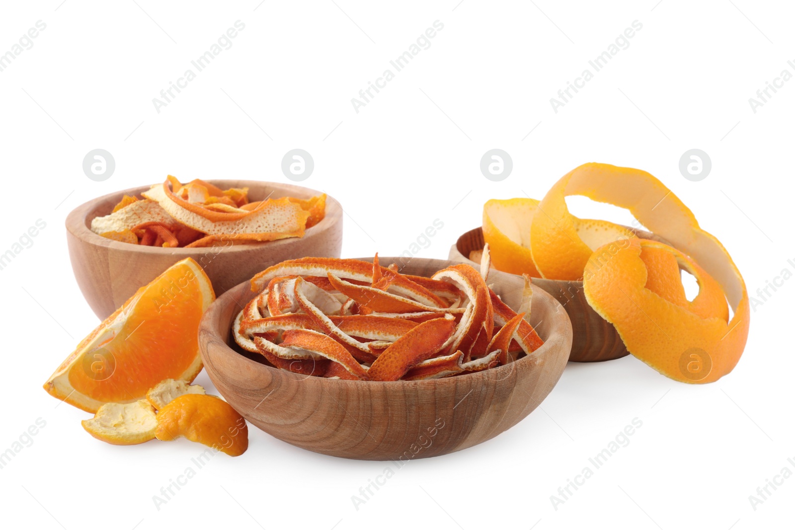 Photo of Dry orange peels and piece of fresh fruit isolated on white