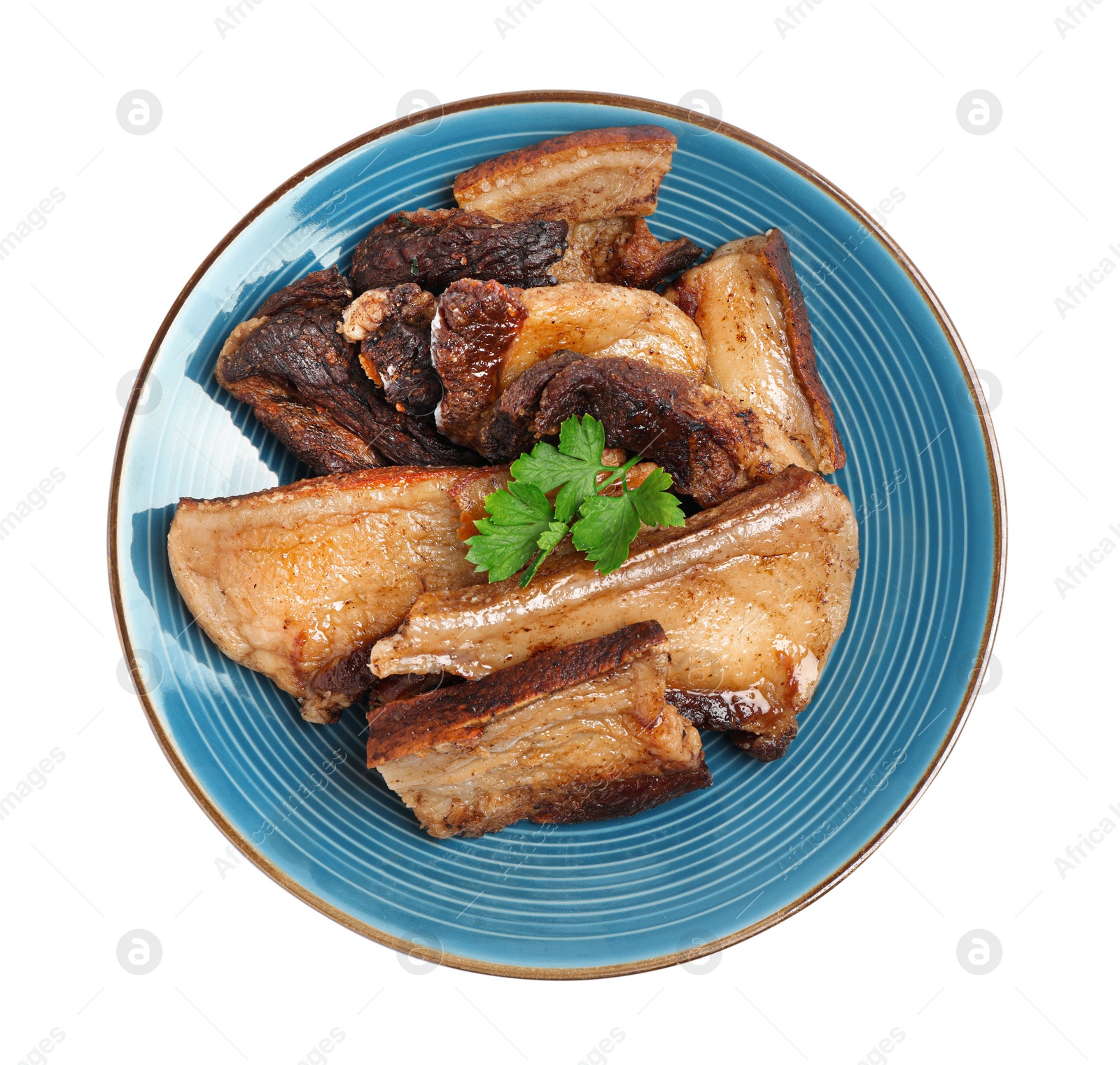 Photo of Tasty fried pork lard with parsley isolated on white