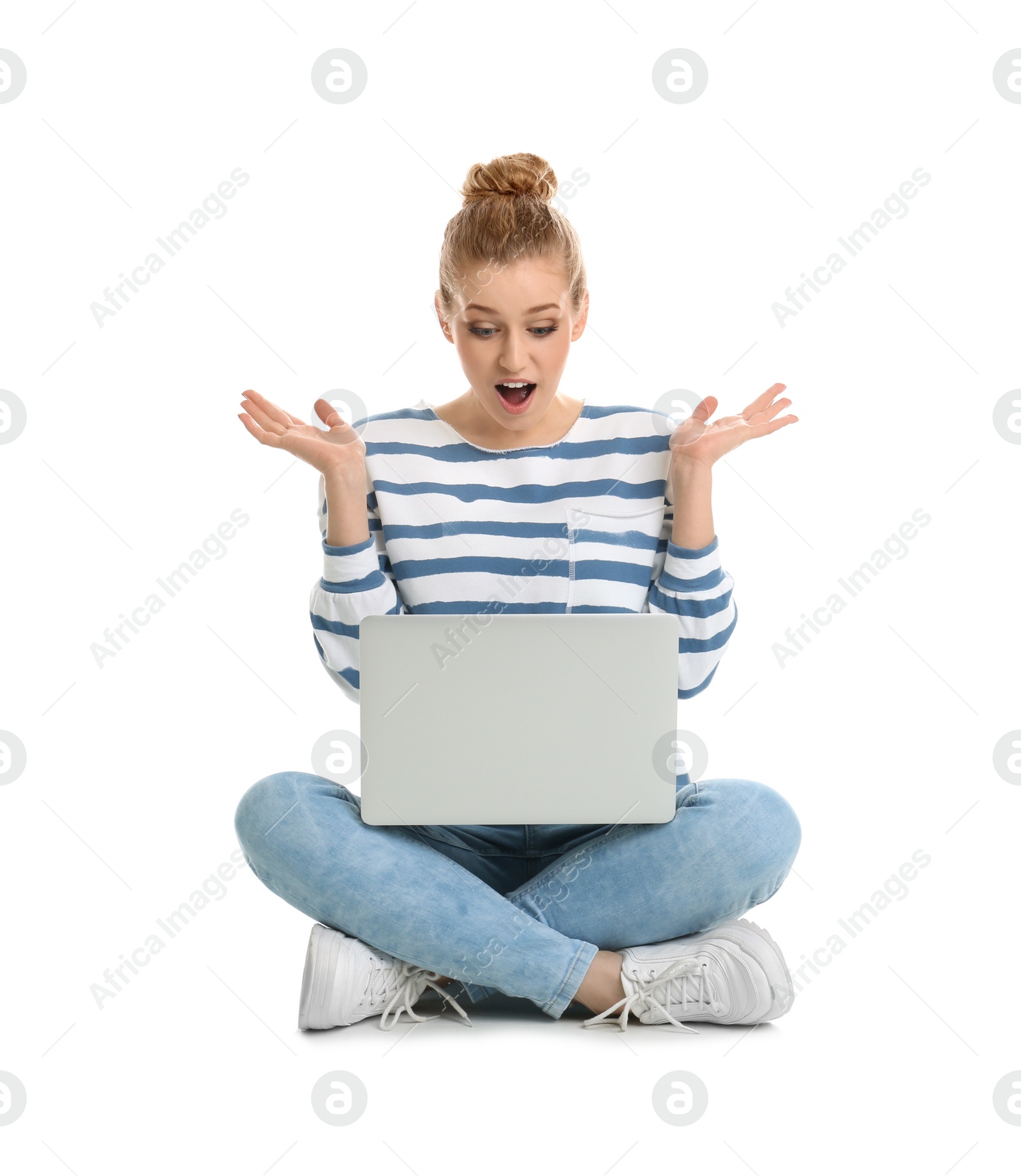 Photo of Emotional young woman with laptop isolated on white