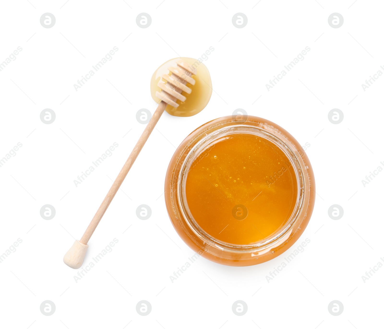 Photo of Tasty honey in glass jar and dipper isolated on white, top view