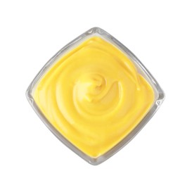 Photo of Bowl with delicious mustard on white background, top view