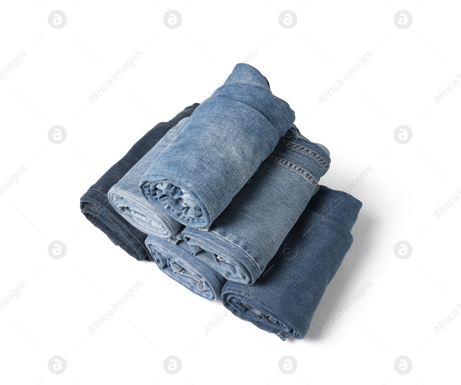 Image of Different stylish rolled jeans isolated on white