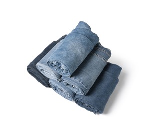 Image of Different stylish rolled jeans isolated on white