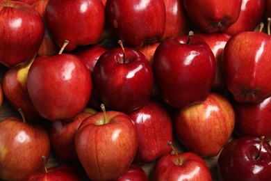 Photo of Fresh ripe red apples as background, top view