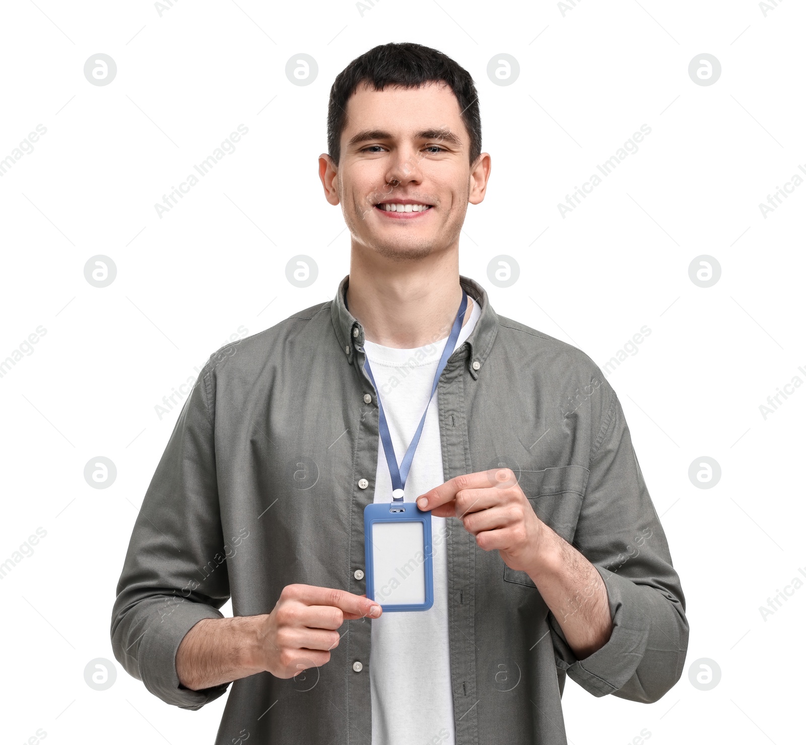 Photo of Smiling man showing empty badge on white background