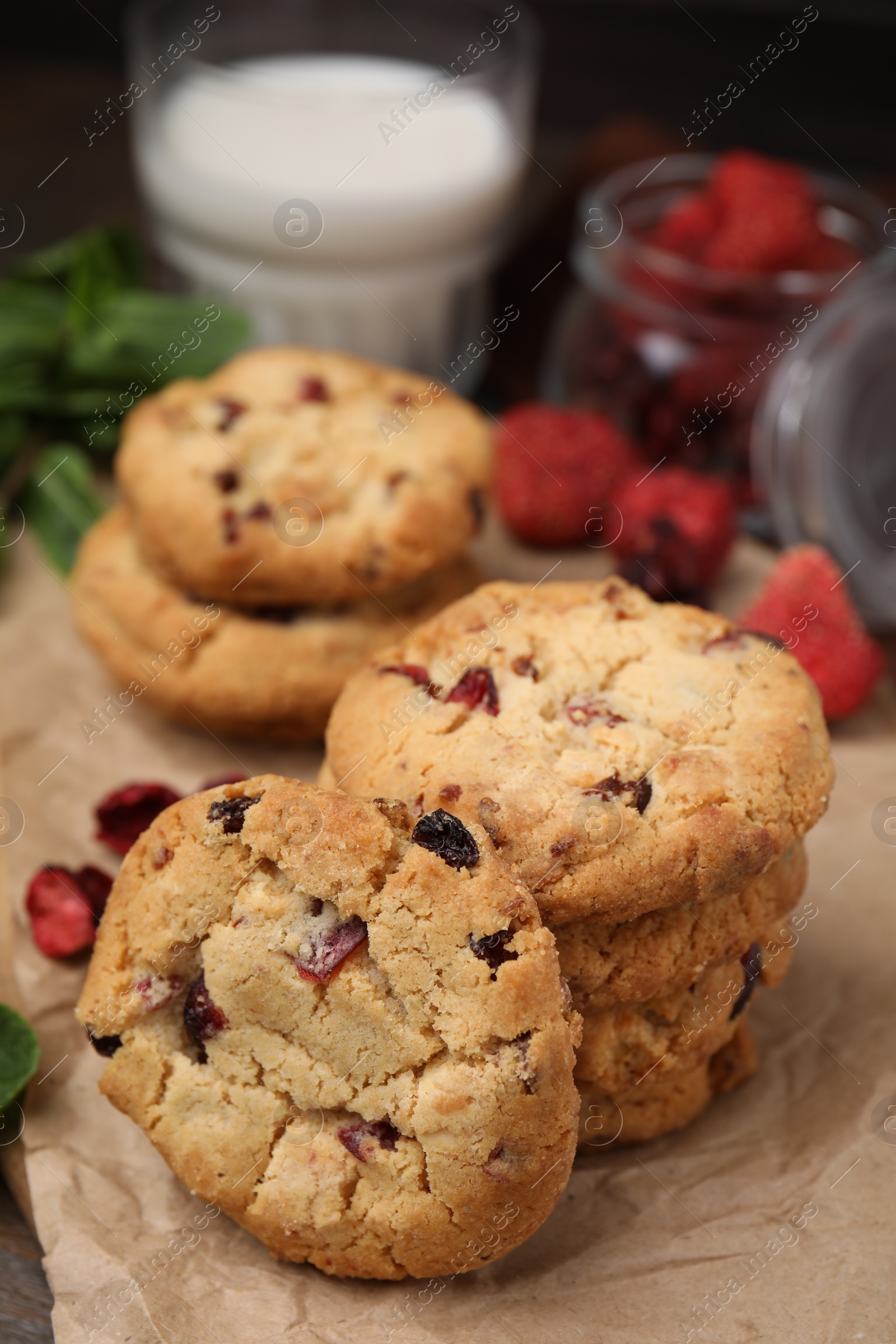 Cookies with freeze dried fruits on parchment paper, closeup Photo of Cookies with freeze dried fruits on parchment paper, closeup