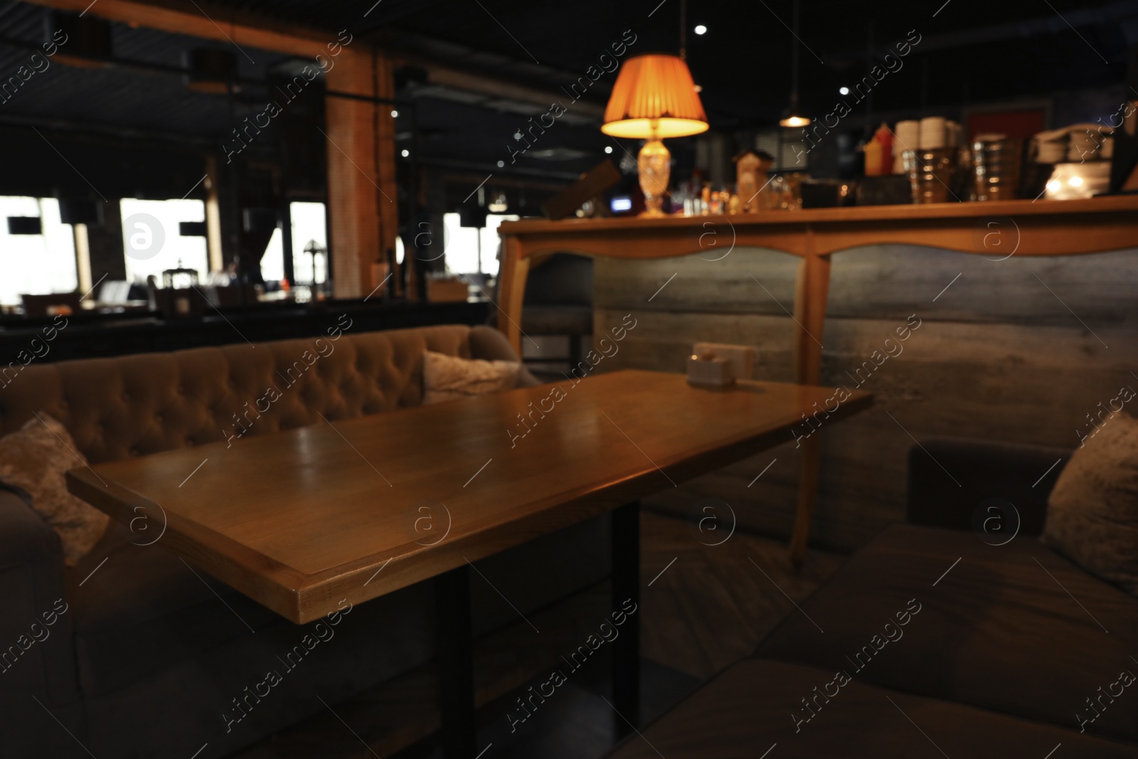 Photo of View of modern cafe with stylish furniture