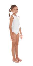 Cute little girl in underwear on white background