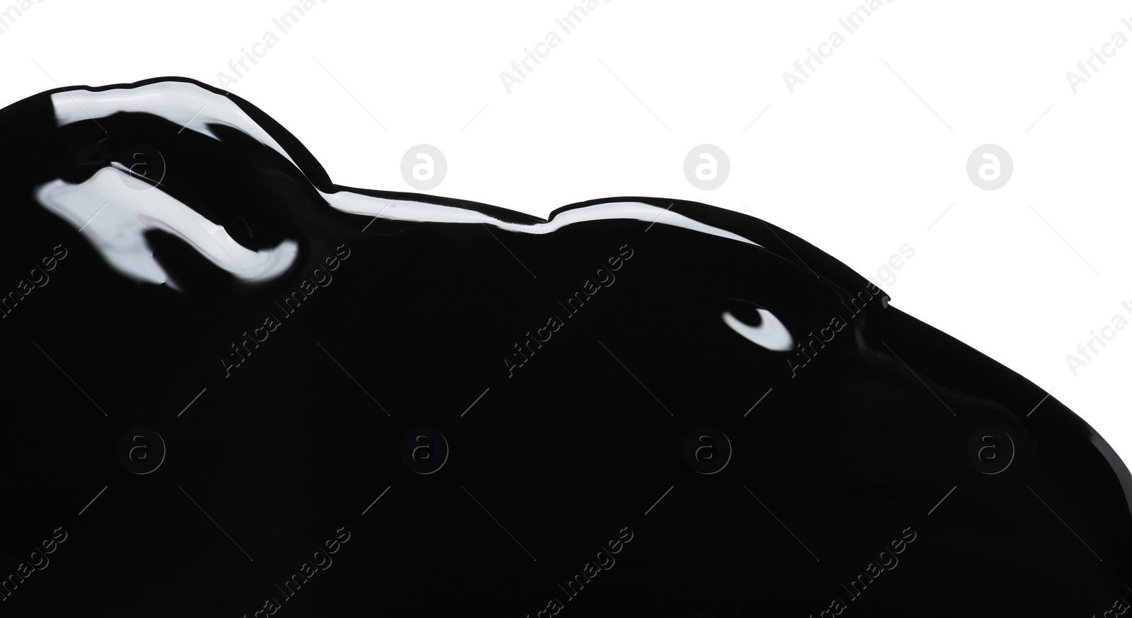 Photo of Black glossy paint spilled on white background, top view