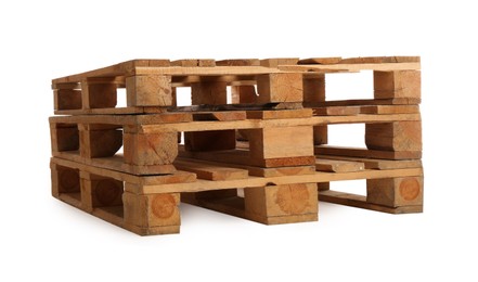 Photo of Stacked wooden pallets isolated on white. Transportation and storage