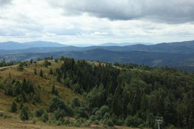 Picturesque view of mountain landscape and cloudy sky