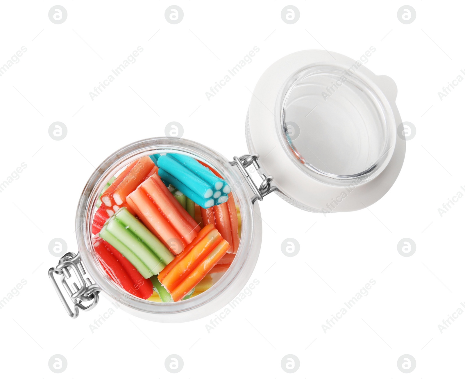 Photo of Tasty jelly candies in jar on white background, top view