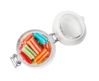 Photo of Tasty jelly candies in jar on white background, top view