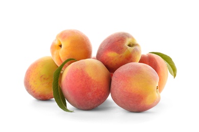 Photo of Fresh sweet peaches on white background